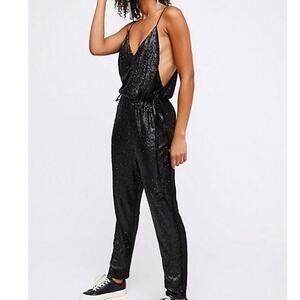 Free People black sequin jumpsuit size small S adjustable